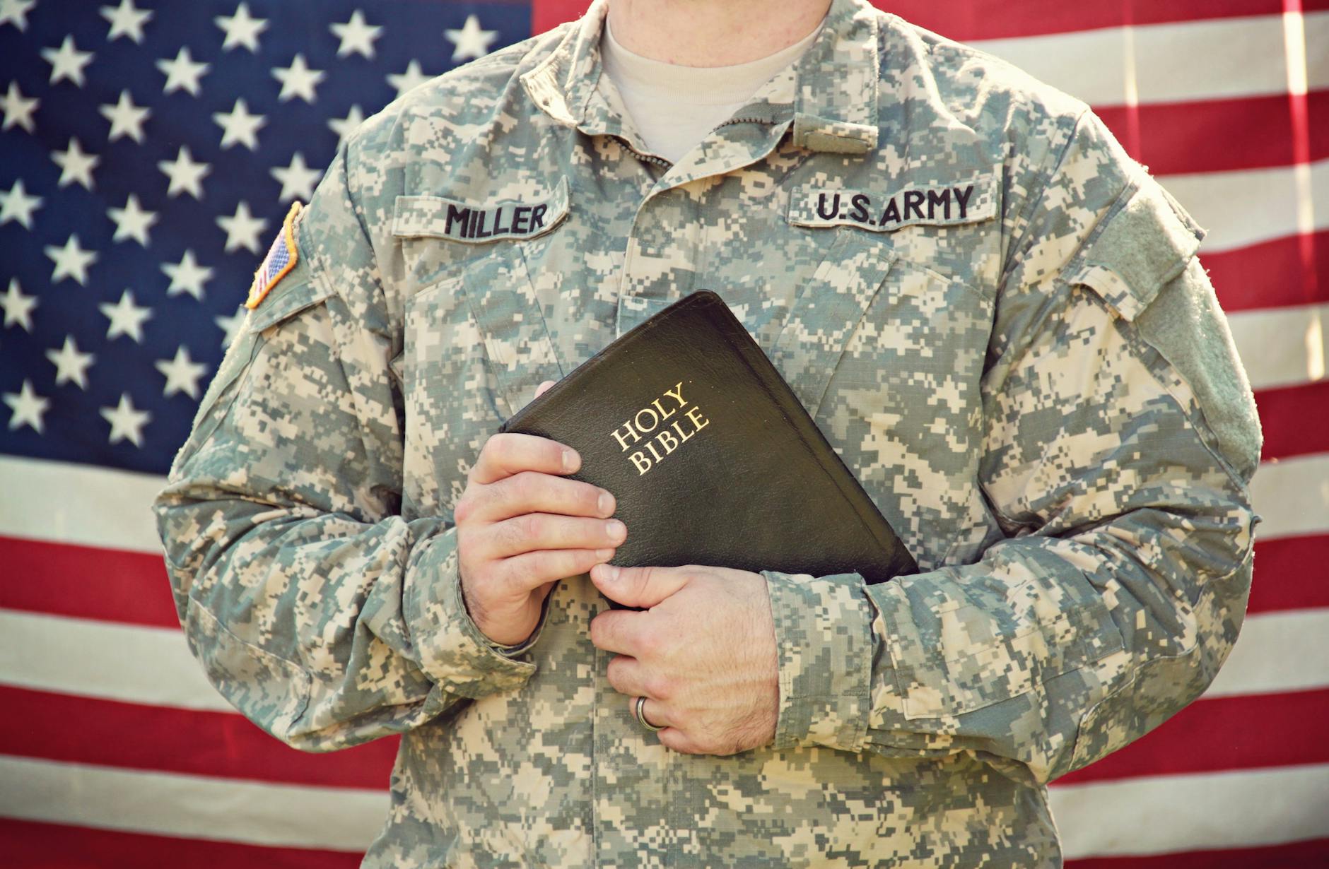 U.S. Space Force man holding bible